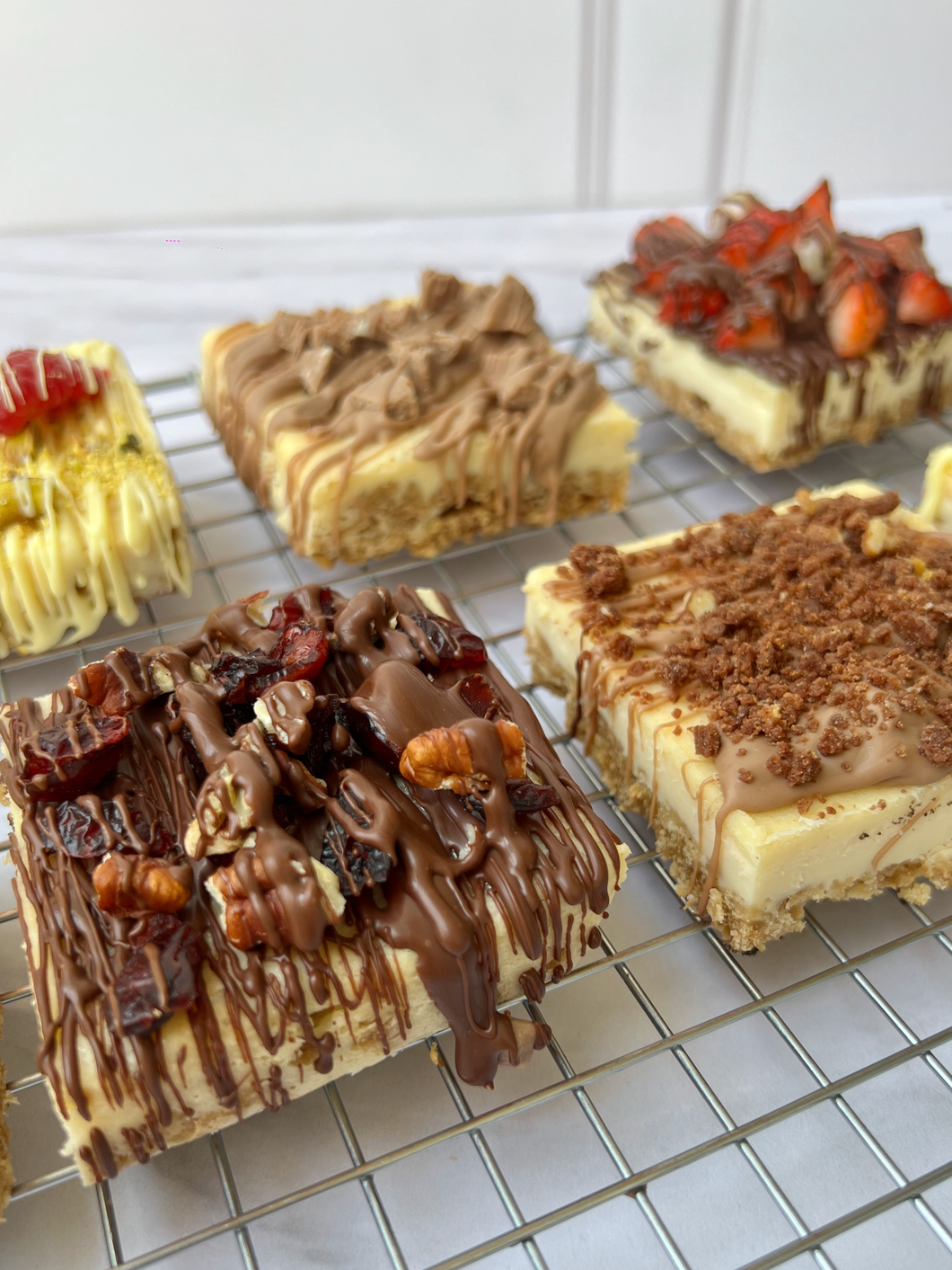 Caja de cheesecake en rebanadas